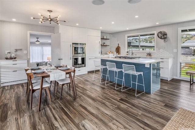 1384 Nanawale Pl, Kailua, HI 96734 - kitchen with modern cabinets, appliances with stainless steel finishes, white cabinetry, backsplash, and recessed lighting