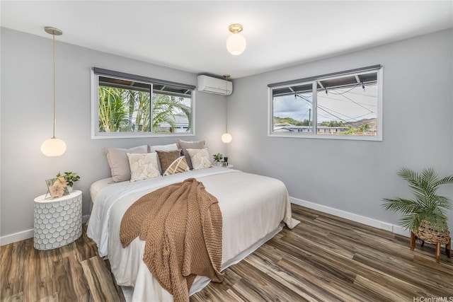 1384 Nanawale Pl, Kailua, HI 96734 - bedroom featuring a wall mounted air conditioner and wood finished floors