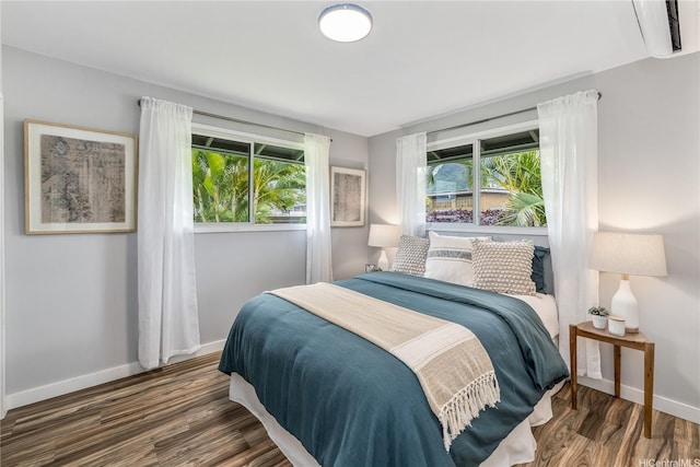 1384 Nanawale Pl, Kailua, HI 96734 - bedroom with multiple windows and wood finished floors