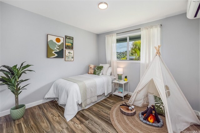 1384 Nanawale Pl, Kailua, HI 96734 - bedroom featuring a wall mounted AC and wood finished floors
