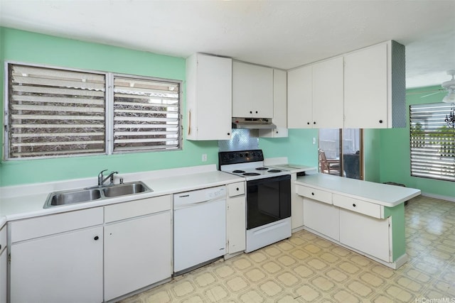 5333 Puahia Pl, Honolulu, HI 96821 - kitchen featuring white dishwasher, electric range, under cabinet range hood, and light flooring