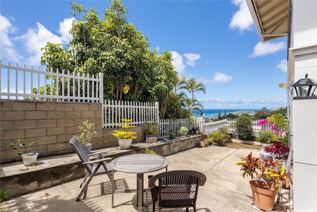 5333 Puahia Pl, Honolulu, HI 96821 - fenced backyard featuring a water view and a patio
