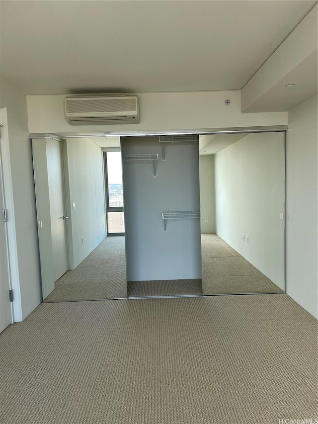 1200 Queen Emma St Unit 3511, Honolulu, HI 96813 - unfurnished bedroom featuring a wall mounted AC and carpet floors
