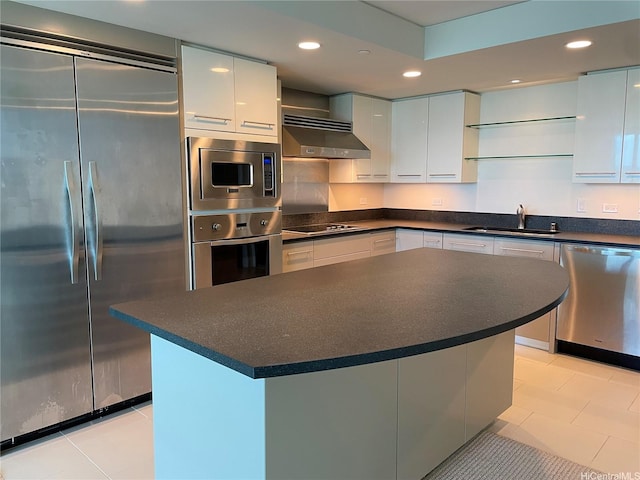 1200 Queen Emma St Unit 3511, Honolulu, HI 96813 - kitchen featuring built in appliances, ventilation hood, dark countertops, light tile patterned flooring, and recessed lighting