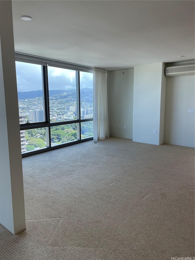 1200 Queen Emma St Unit 3511, Honolulu, HI 96813 - carpeted spare room featuring floor to ceiling windows and a wall unit AC
