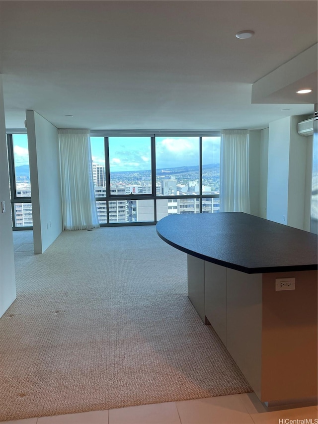 1200 Queen Emma St Unit 3511, Honolulu, HI 96813 - kitchen with healthy amount of natural light, carpet flooring, floor to ceiling windows, dark countertops, and a kitchen island