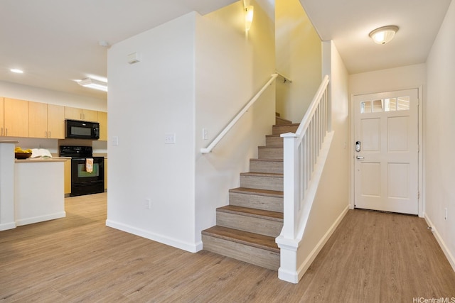 95-983 Ukuwai St Unit 2901, Mililani, HI 96789 - foyer with light wood finished floors and stairway