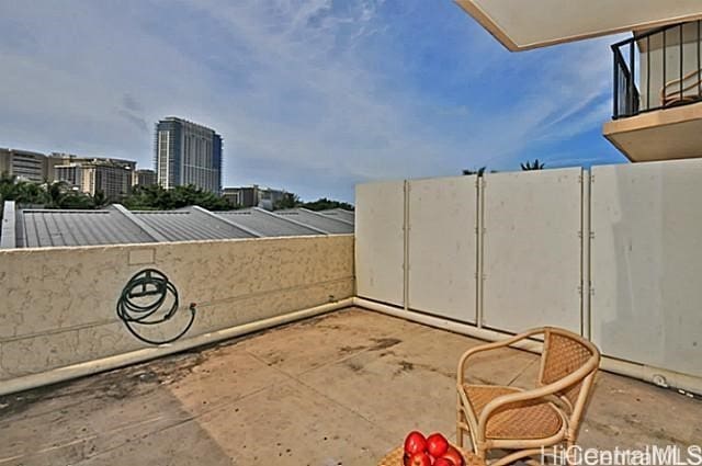 2045 Kalakaua Ave Unit 114, Honolulu, HI 96815 - patio / terrace featuring a patio and a view of city
