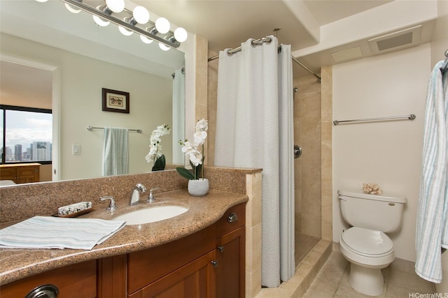 343 Hobron Ln Unit 3401, Honolulu, HI 96815 - bathroom with vanity, tile patterned floors, and tiled shower
