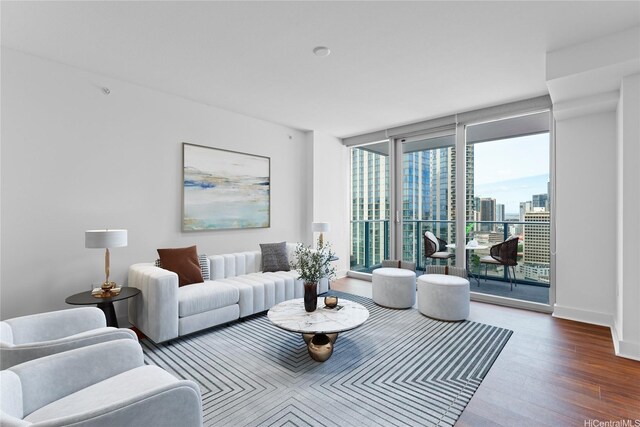629 Keeaumoku St Unit 2408, Honolulu, HI 96814 - living room with wood finished floors and expansive windows