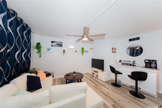 1911 Kalakaua Ave Unit 209, Honolulu, HI 96815 - living area featuring ceiling fan and light wood-type flooring