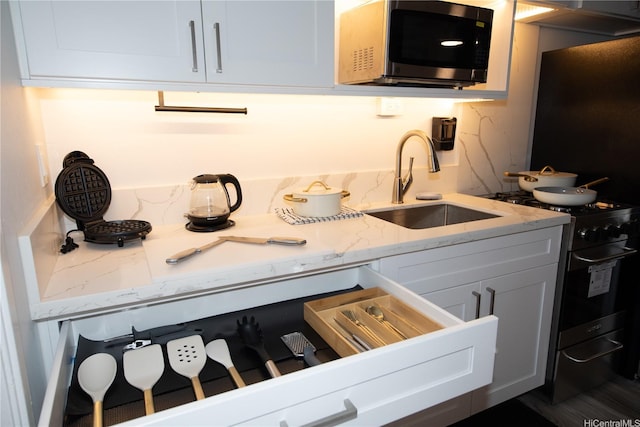 1911 Kalakaua Ave Unit 209, Honolulu, HI 96815 - kitchen featuring stainless steel appliances and light stone counters