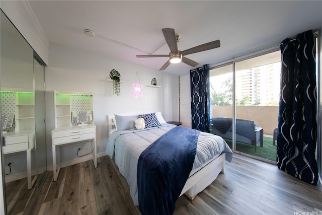 1911 Kalakaua Ave Unit 209, Honolulu, HI 96815 - bedroom featuring access to exterior, wood finished floors, and a ceiling fan