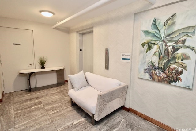 1860 Ala Moana Blvd Unit 910, Honolulu, HI 96815 - living area featuring elevator and baseboards