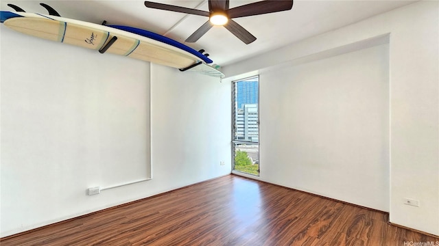 1655 Makaloa St Unit 903, Honolulu, HI 96814 - unfurnished room with wood finished floors and a ceiling fan