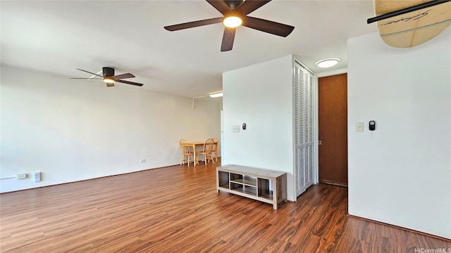1655 Makaloa St Unit 903, Honolulu, HI 96814 - empty room featuring a ceiling fan and wood finished floors