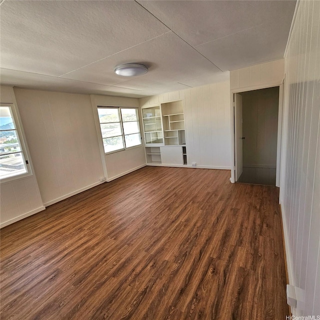 3216 Kaimuki Ave, Honolulu, HI 96816 - unfurnished room with dark wood-type flooring and a textured ceiling