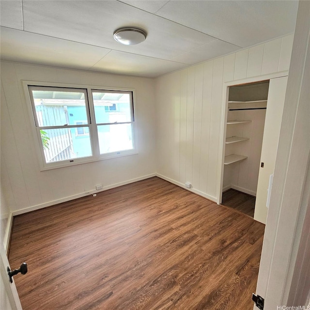 3216 Kaimuki Ave, Honolulu, HI 96816 - unfurnished bedroom with wood finished floors and baseboards