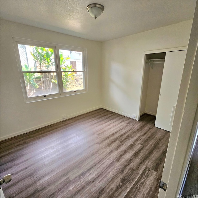 3216 Kaimuki Ave, Honolulu, HI 96816 - unfurnished bedroom featuring wood finished floors and a closet