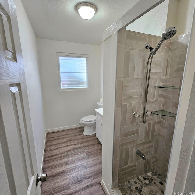 3216 Kaimuki Ave, Honolulu, HI 96816 - bathroom featuring a shower stall, vanity, and wood finished floors
