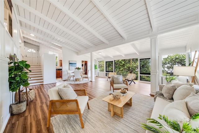 1670 Halekoa Dr, Honolulu, HI 96821 - living room featuring light wood-style floors, stairs, decorative columns, and wood ceiling