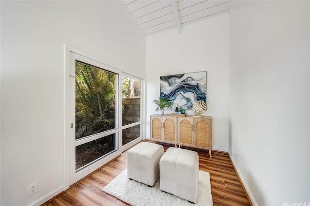 1670 Halekoa Dr, Honolulu, HI 96821 - living area with wood finished floors, beamed ceiling, and high vaulted ceiling