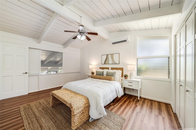 1670 Halekoa Dr, Honolulu, HI 96821 - bedroom featuring a wall mounted AC, light wood-style flooring, a closet, wooden ceiling, and multiple windows
