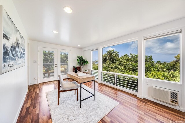 1670 Halekoa Dr, Honolulu, HI 96821 - home office featuring french doors, wood finished floors, a wall mounted air conditioner, and recessed lighting