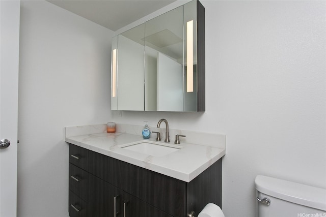 615 Keawe St Unit 1903, Honolulu, HI 96813 - bathroom featuring toilet and vanity