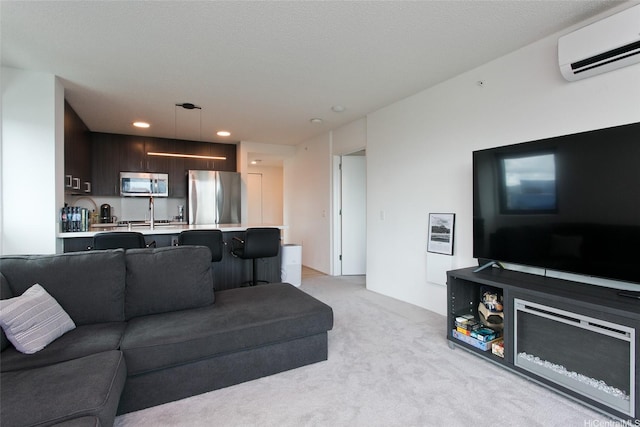 615 Keawe St Unit 1903, Honolulu, HI 96813 - living area featuring an AC wall unit, light carpet, and recessed lighting