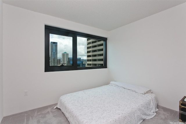 615 Keawe St Unit 1903, Honolulu, HI 96813 - bedroom featuring carpet flooring