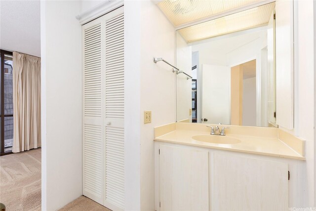 930 Kaheka St Unit 802, Honolulu, HI 96814 - bathroom featuring a closet and vanity