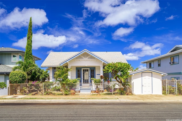 3413 Winam Ave, Honolulu, HI 96815 - view of front of house featuring a fenced front yard, a porch, a shed, and a shingled roof