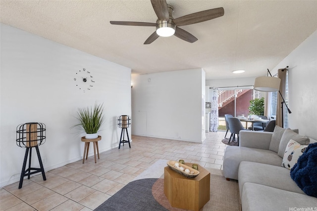 3225 Ala Ilima St Unit 2, Honolulu, HI 96818 - living room with ceiling fan, light tile patterned flooring, and a textured ceiling