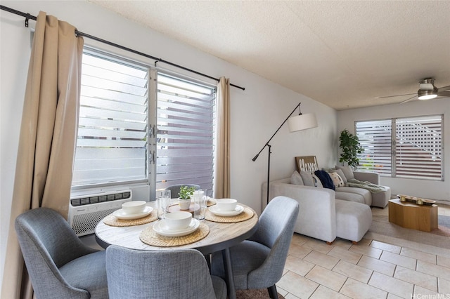 3225 Ala Ilima St Unit 2, Honolulu, HI 96818 - dining space with a ceiling fan, a textured ceiling, light tile patterned flooring, and cooling unit