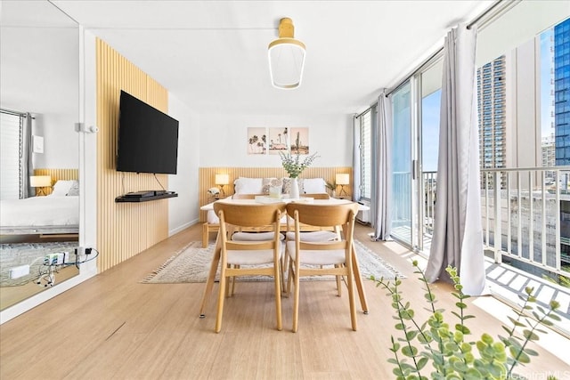 2427 Kuhio Ave Unit 1205, Honolulu, HI 96815 - dining room featuring wood finished floors