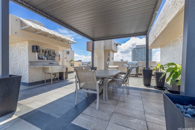 2345 Ala Wai Blvd Unit 1918, Honolulu, HI 96815 - view of patio / terrace featuring outdoor dining space and a grill