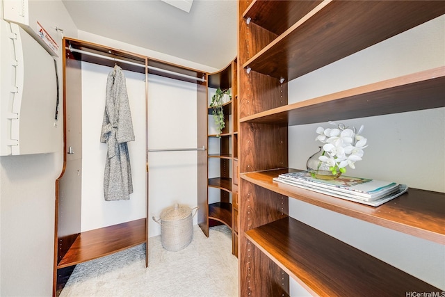 580 Lunalilo Home Rd Unit 358, Honolulu, HI 96825 - spacious closet with carpet floors, built in desk, and electric panel