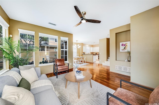 580 Lunalilo Home Rd Unit 358, Honolulu, HI 96825 - living area with plenty of natural light, ceiling fan, and wood finished floors