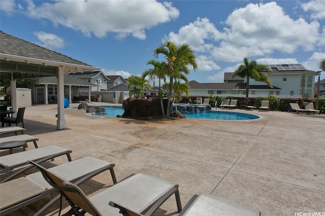 91-1526 Kaikohola St Unit D1, Ewa Beach, HI 96706 - community pool featuring a patio and a residential view
