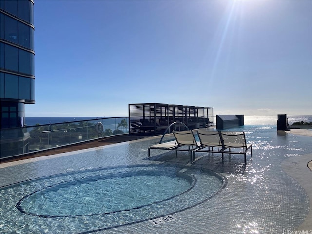 1108 Auahi St Unit 2906, Honolulu, HI 96814 - view of pool with a water view and a hot tub