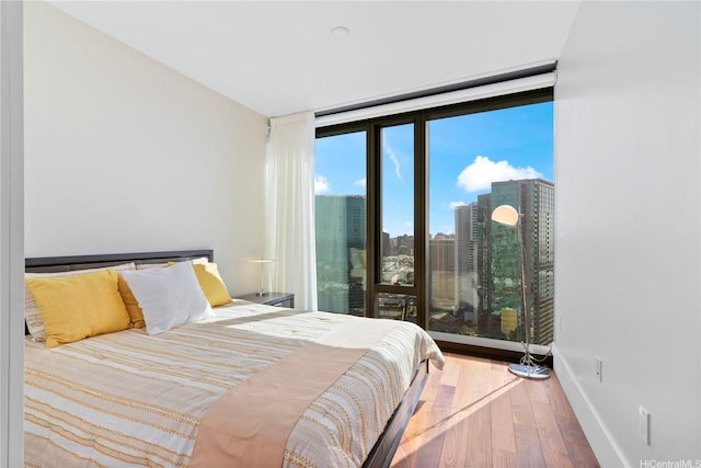 1108 Auahi St Unit 2906, Honolulu, HI 96814 - bedroom with wood finished floors and baseboards