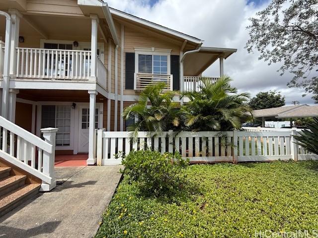 94-586 Lumiauau St Unit N104, Waipahu, HI 96797 - view of property exterior featuring a balcony