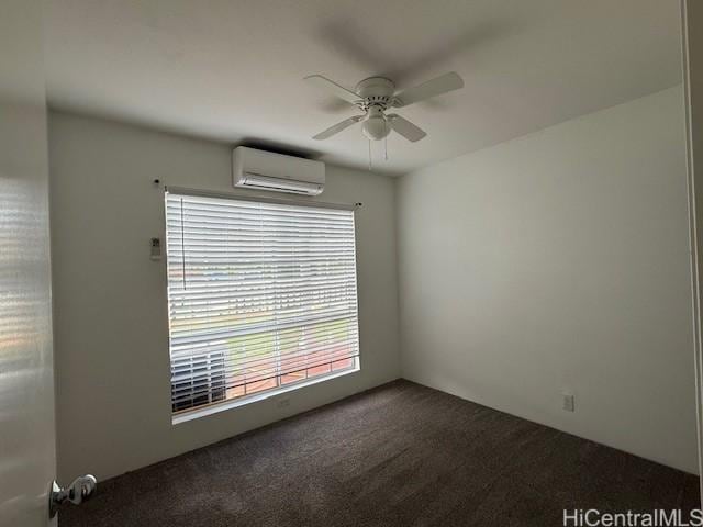 94-586 Lumiauau St Unit N104, Waipahu, HI 96797 - empty room featuring a wall mounted air conditioner, dark colored carpet, and a ceiling fan