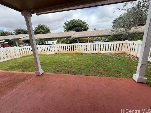 94-586 Lumiauau St Unit N104, Waipahu, HI 96797 - fenced backyard featuring a patio