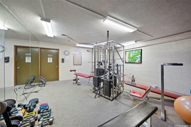 2740 Kuilei St Unit 803, Honolulu, HI 96826 - exercise room featuring a textured ceiling and a textured wall