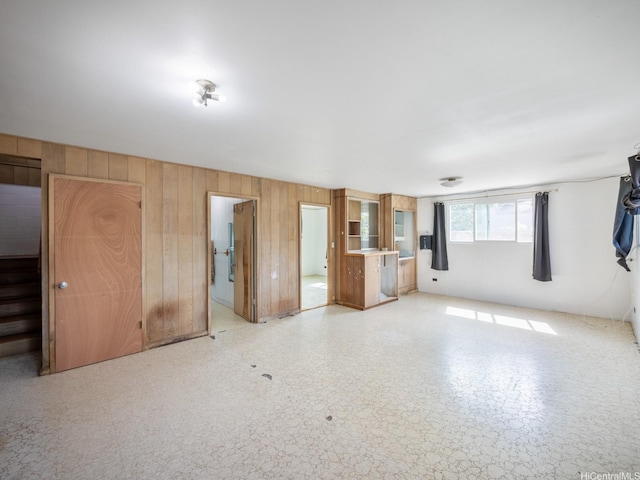 1114 8th Ave, Honolulu, HI 96816 - unfurnished living room with wood walls