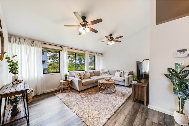 95-150 Kuahelani Ave Unit 255, Mililani, HI 96789 - living room featuring vaulted ceiling, ceiling fan, and dark wood-type flooring