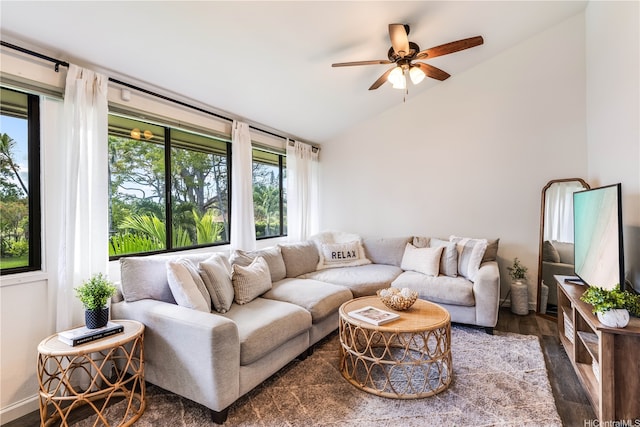95-150 Kuahelani Ave Unit 255, Mililani, HI 96789 - living area featuring vaulted ceiling, healthy amount of natural light, a ceiling fan, and wood finished floors