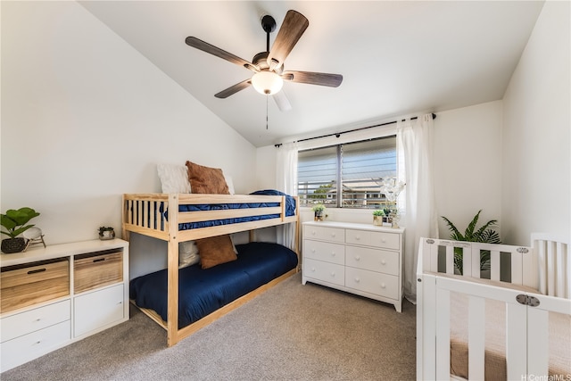 95-150 Kuahelani Ave Unit 255, Mililani, HI 96789 - bedroom featuring vaulted ceiling, light carpet, and ceiling fan